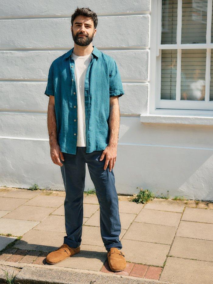 man in blue shirt